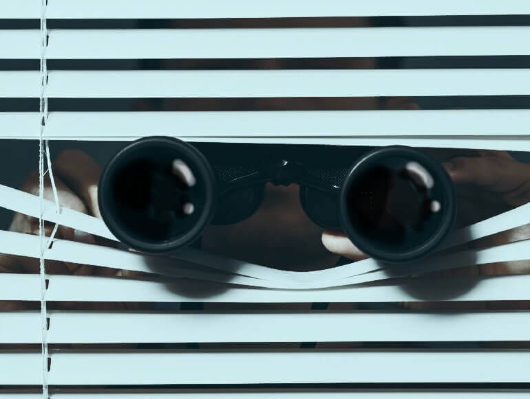 Spy with binoculars
